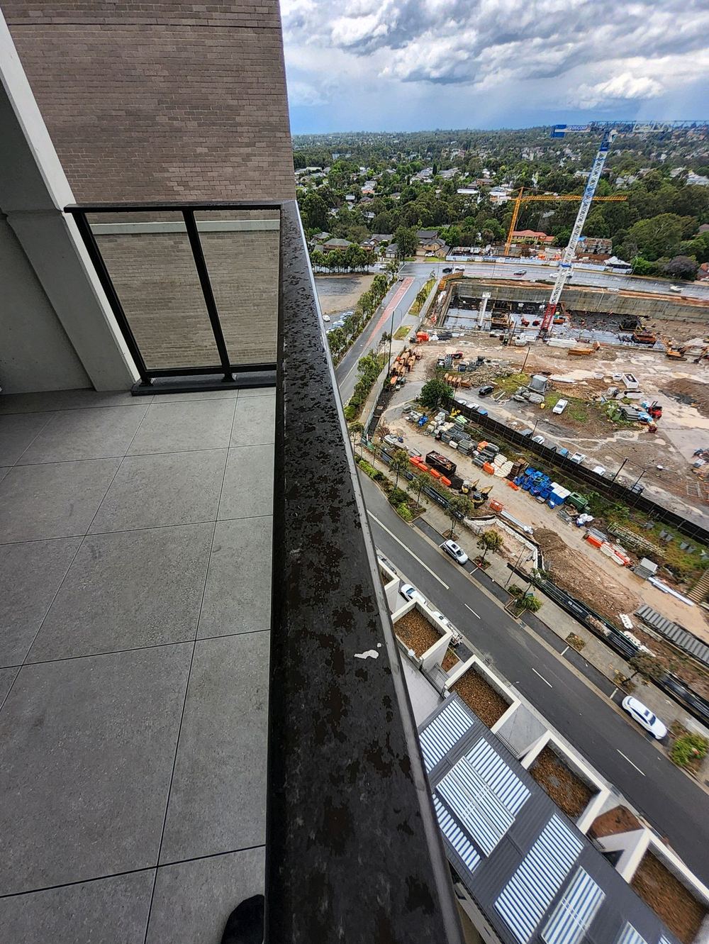 Paint peeling from a balcony handrail, to be made good before settlement, Castle Hill