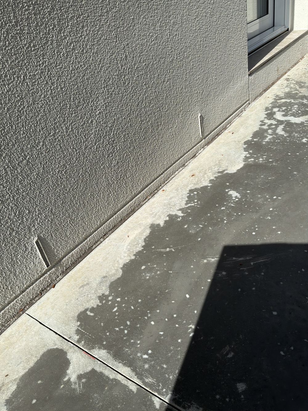 Damp proof course sitting closer than 50 mm to the finished ground, found during a handover inspection in Castle Hill