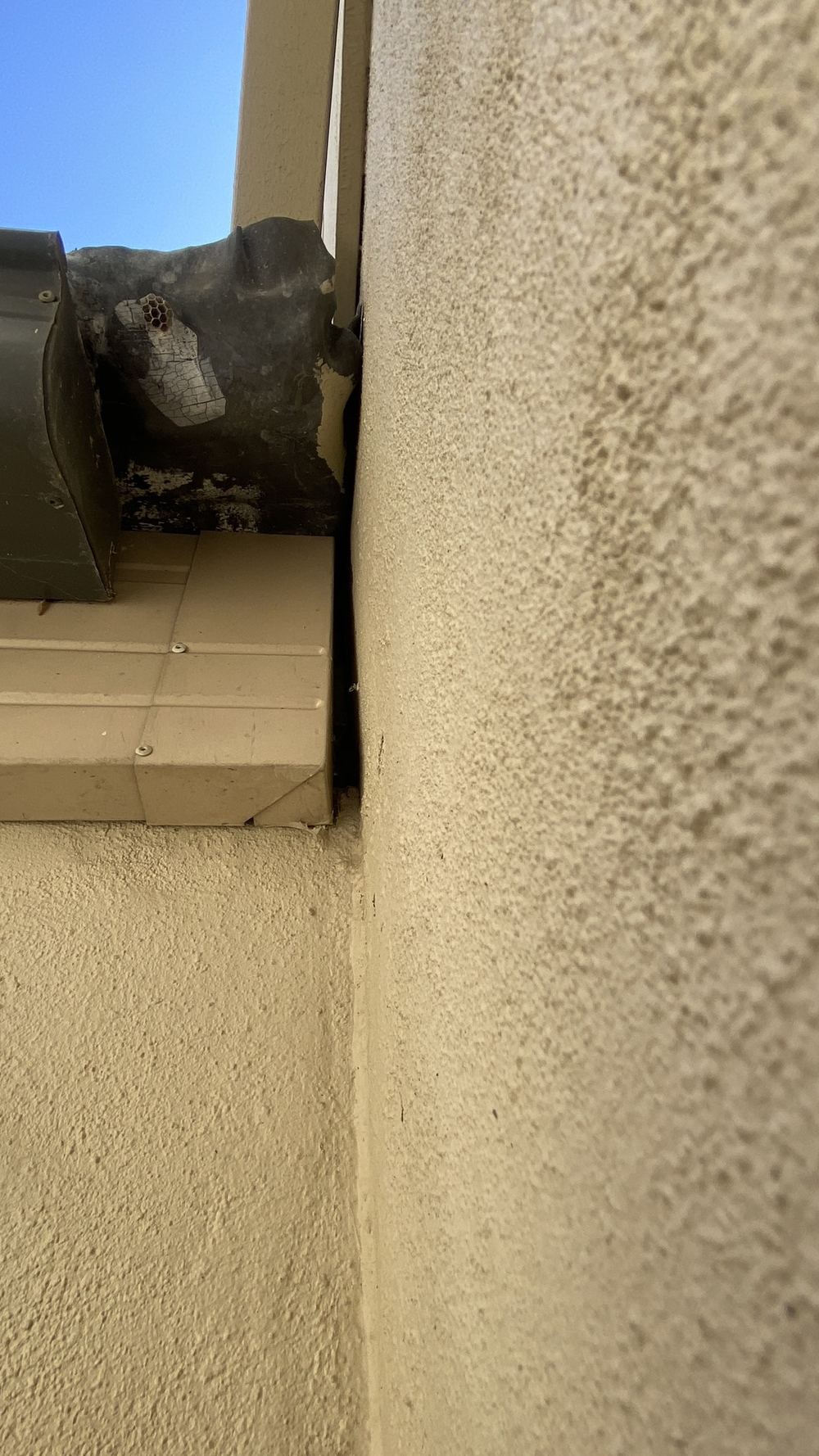 Open gap between gutter and brick wall, letting in water and pests, found during a pre-purchase building and pest inspection in Castle Hill