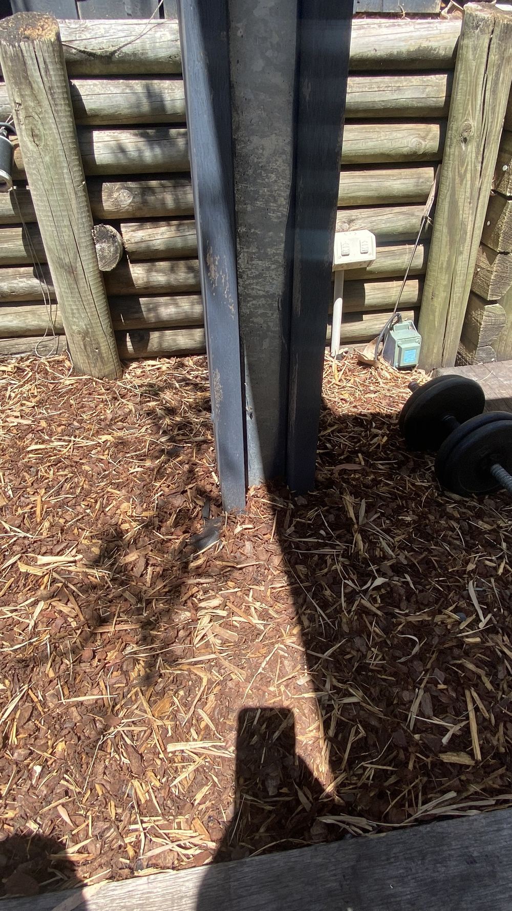 Timber post set straight into the soil, open to decay and termites, found during a pre-purchase building and pest inspection in Castle Hill