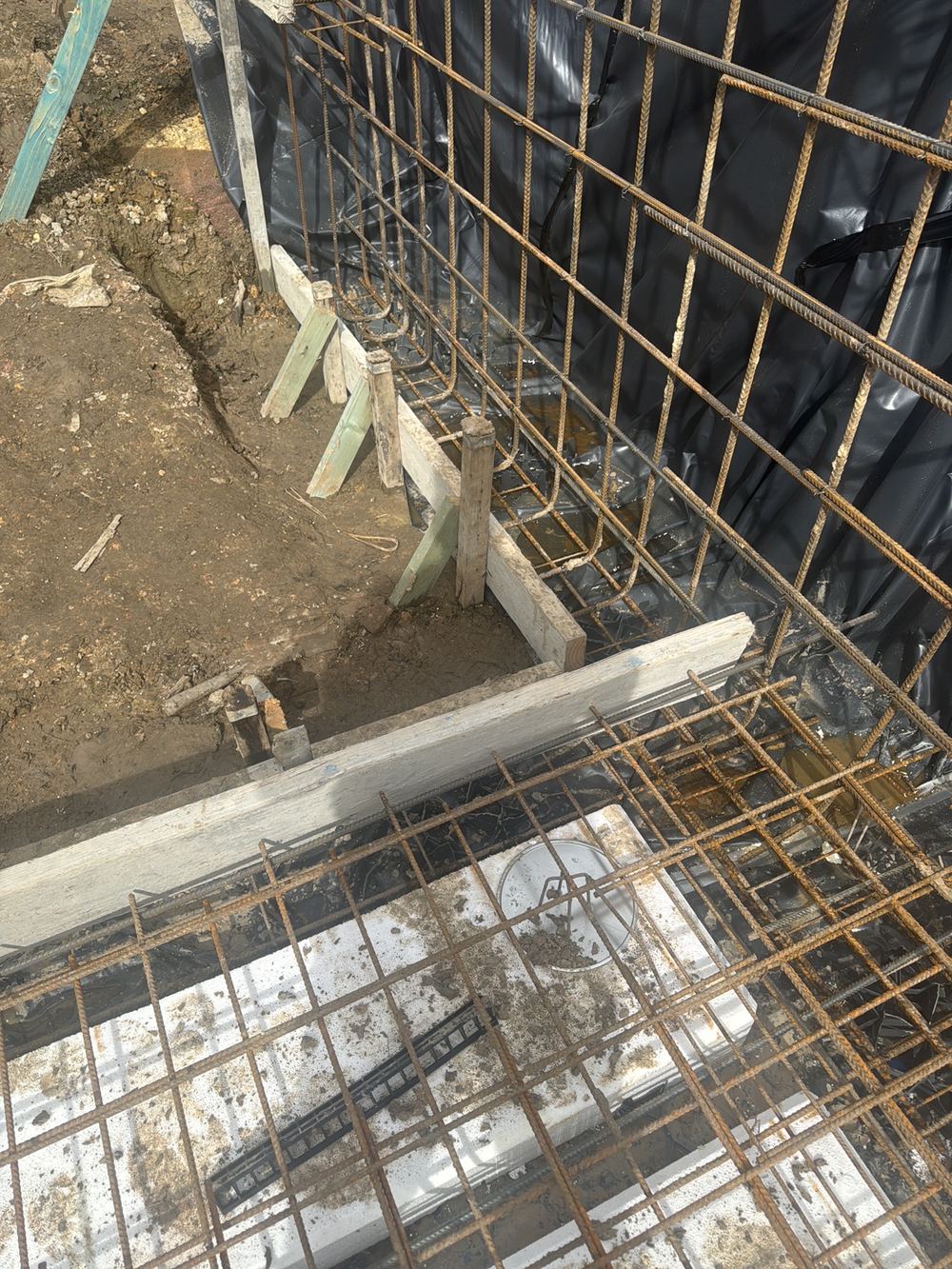 Concrete cover to slab reinforcement below the minimum in places, found during a slab pre-pour inspection in Pennant Hills