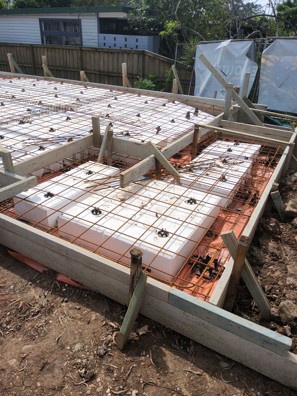 Waffle pods loose and unfixed, threatening the beam widths, found during a slab pre-pour inspection in Pennant Hills