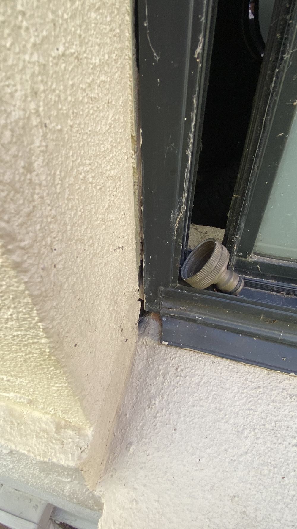 Gap between window frame and brickwork with no infill or trim, found during a pre-purchase building and pest inspection in Castle Hill