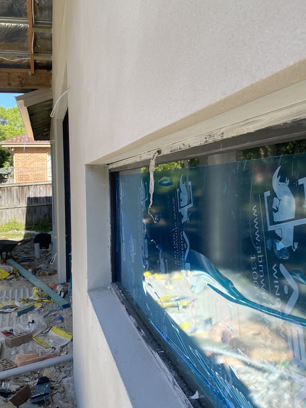 Window head and side infills left incomplete, found during a fixing stage inspection in Kellyville